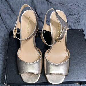 Coach gold heels